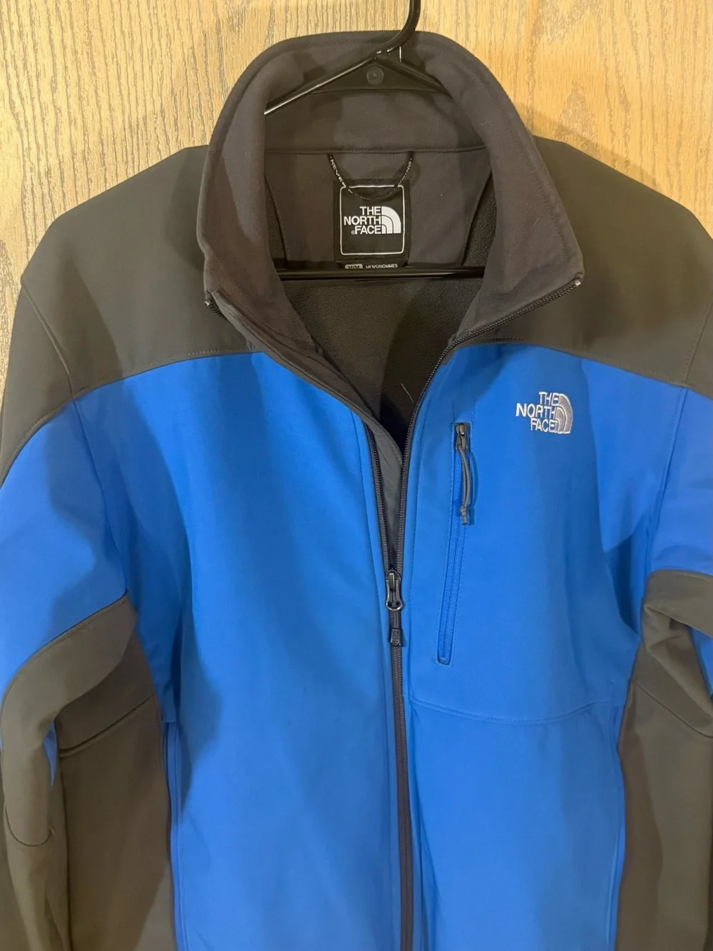 The North Face Men’s Blue and Charcoal Softshell Jacket